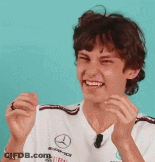 Young Man In Mercedes Shirt Laughing Clapping GIF