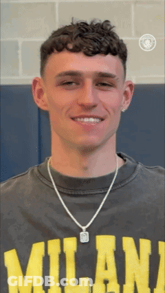 Young Man In Milan T-Shirt Smiles GIF