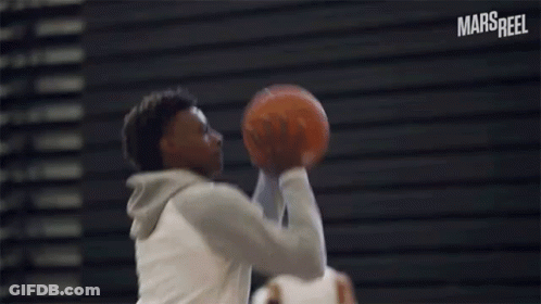 Young Man In Nike Hoodie Looking Up GIF