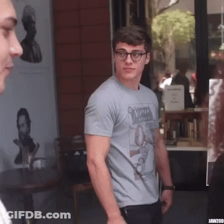 Young Man In Ninja T-Shirt GIF