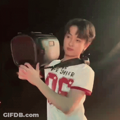 Young Man In Number 10 Jersey Holding Boxing Glove GIF