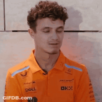 Young Man In Orange Polo With Dell Logo GIF