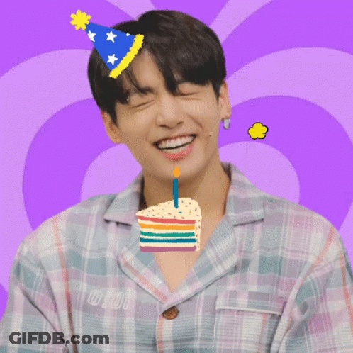 Young Man In Party Hat Holding Cake In Mouth Saying Happy Birthday GIF