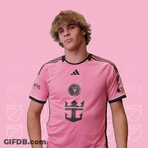 Young Man In Pink Adidas Shirt With Crown GIF