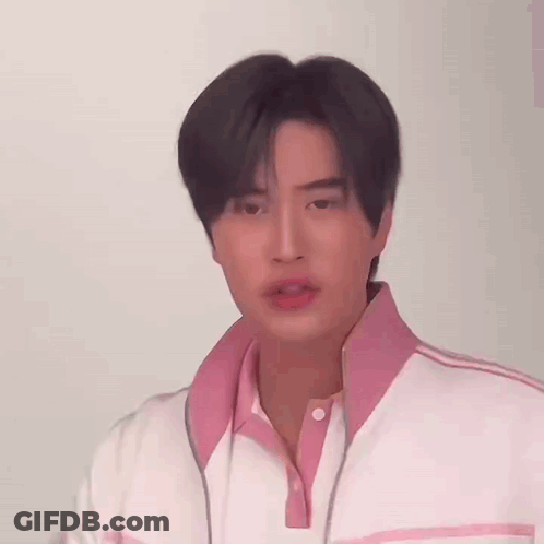 Young Man In Pink And White Jacket GIF