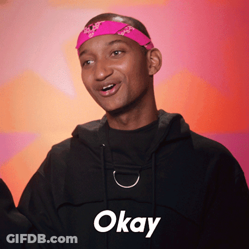 Young Man In Pink Headband And Black Hoodie Says Okay GIF