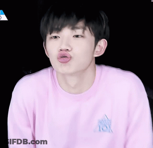 Young Man In Pink Shirt Saying Produce 101 Blowing Kiss GIF
