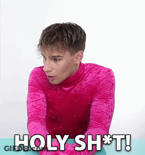 Young Man In Pink Turtleneck Says Holy Shit GIF