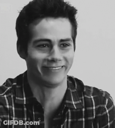 Young Man In Plaid Shirt Black And White GIF