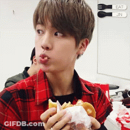 Young Man In Plaid Shirt Eating Hamburger GIF