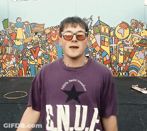 Young Man In Purple Enja Shirt With Sunglasses GIF