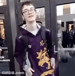 Young Man In Purple Hoodie With Wolf Standing At Door GIF
