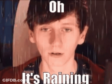 Young Man In Rain Saying Oh It's Raining GIF