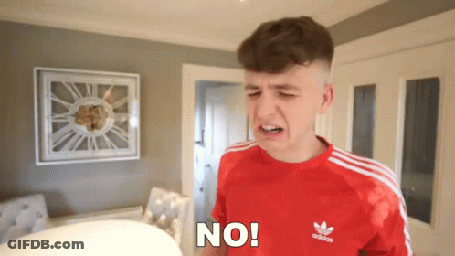 Young Man In Red Adidas Shirt Making A Face GIF