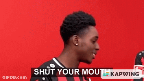Young Man In Red And Black Striped Shirt Making Funny Face GIF