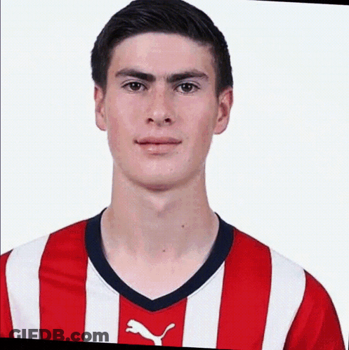 Young Man In Red And White Soccer Jersey GIF