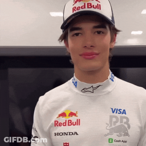 Young Man In Red Bull Hat And White Shirt GIF