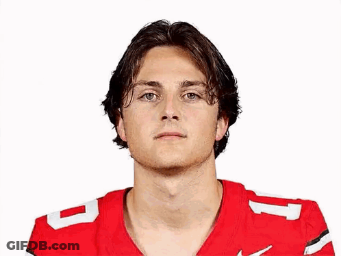 Young Man In Red Football Jersey Number 1 Posing GIF