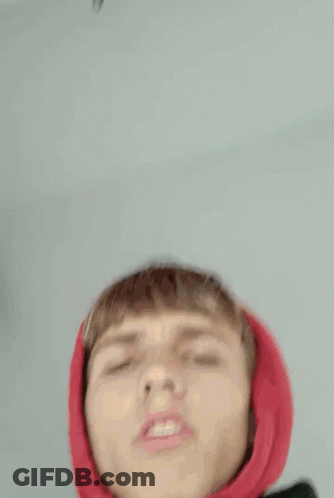 Young Man In Red Hoodie Making Funny Face GIF