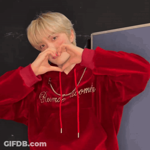 Young Man In Red Hoodie Making Heart With Hands GIF