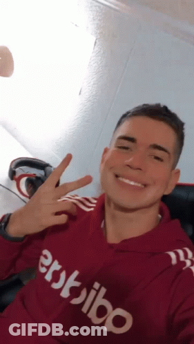 Young Man In Red Hoodie Saying Erdibo GIF