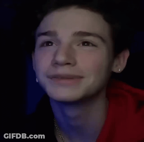 Young Man In Red Hoodie With Earrings GIF
