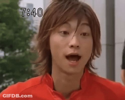 Young Man In Red Jacket Making Funny Face GIF