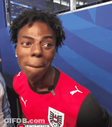 Young Man In Red Puma Shirt Making Face GIF