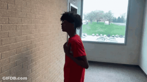 Young Man In Red Shirt GIF