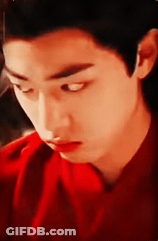 Young Man In Red Shirt Close Up GIF