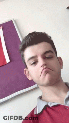 Young Man In Red Shirt Funny Face Purple Board GIF