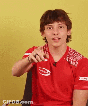 Young Man In Red Shirt Pointing GIF