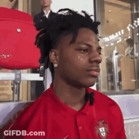 Young Man In Red Shirt With Portugal Badge GIF