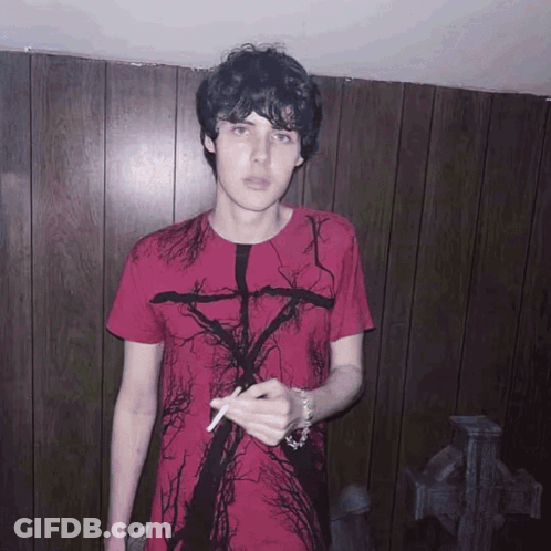 Young Man In Red Shirt With Tree Smoking Cigarette GIF