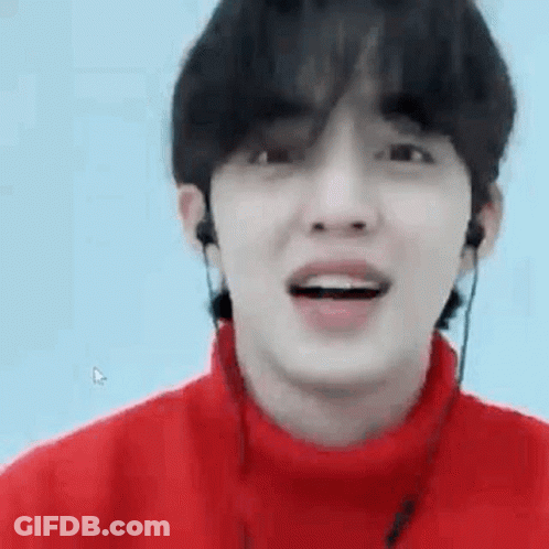 Young Man In Red Sweater With Earphones Smiling GIF