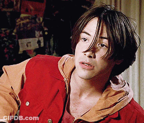 Young Man In Red Vest And Tan Shirt GIF