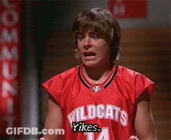 Young Man In Red Wildcats Jersey GIF