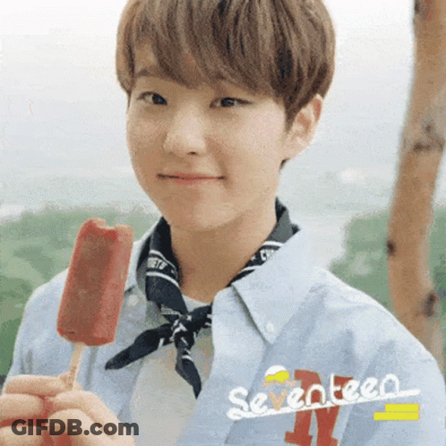 Young Man In Seventeen Shirt Holding Popsicle GIF