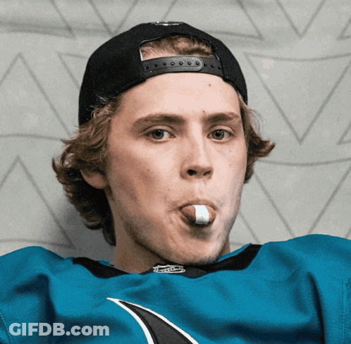 Young Man In Sharks Jersey And Black Hat GIF