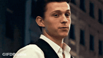 Young Man In Striped Shirt GIF