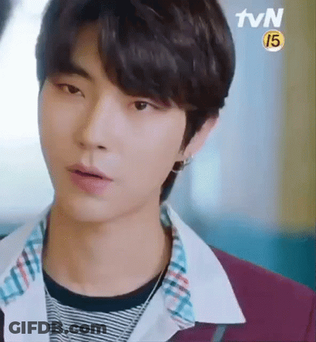 Young Man In Striped Shirt Close Up GIF