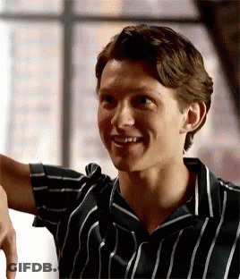 Young Man In Striped Shirt GIF