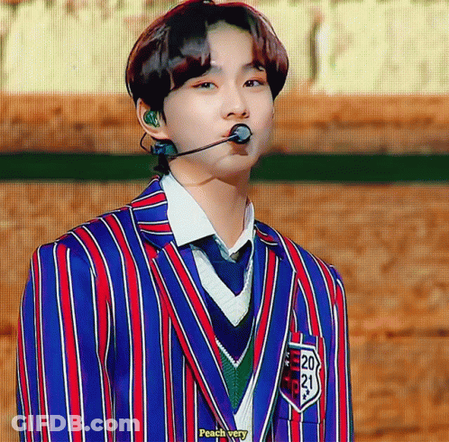 Young Man In Striped Suit With Number 20 GIF