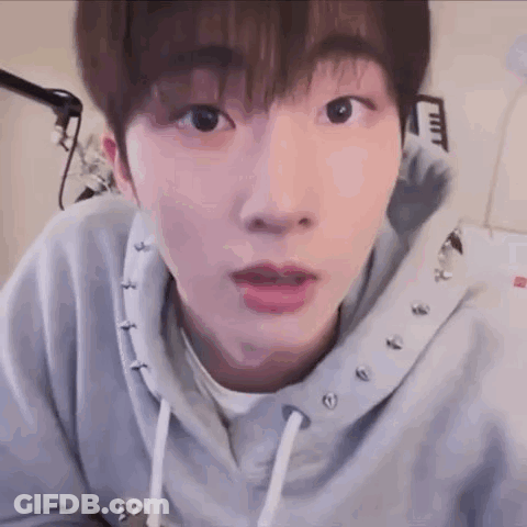 Young Man In Studded Hoodie GIF