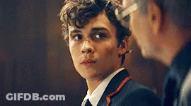 Young Man In Suit And Tie Next To Another Man GIF