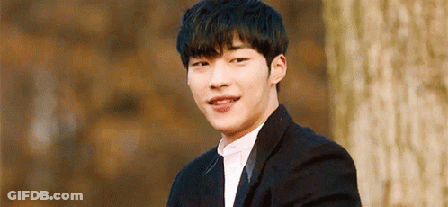 Young Man In Suit And Tie Smiling GIF