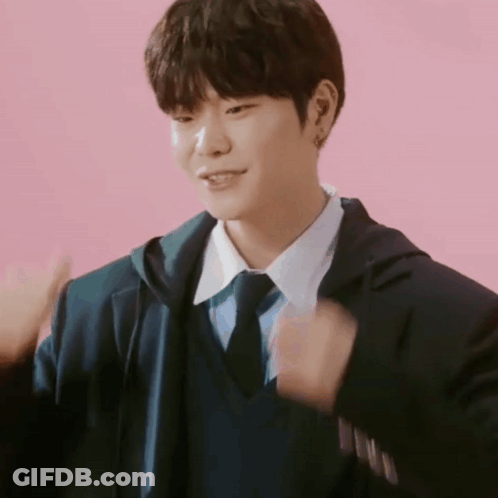 Young Man In Suit Giving Thumbs Up GIF