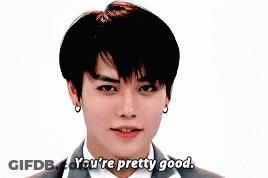 Young Man In Suit Says You're Pretty Good GIF