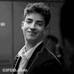 Young Man In Suit Smiling GIF