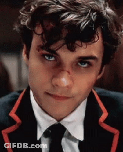 Young Man In Suit With Red Striped Tie GIF